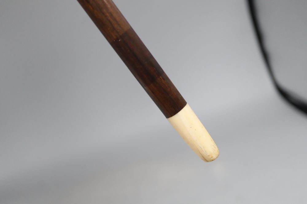 An ivory handled walking cane, c.1920, length 90cm